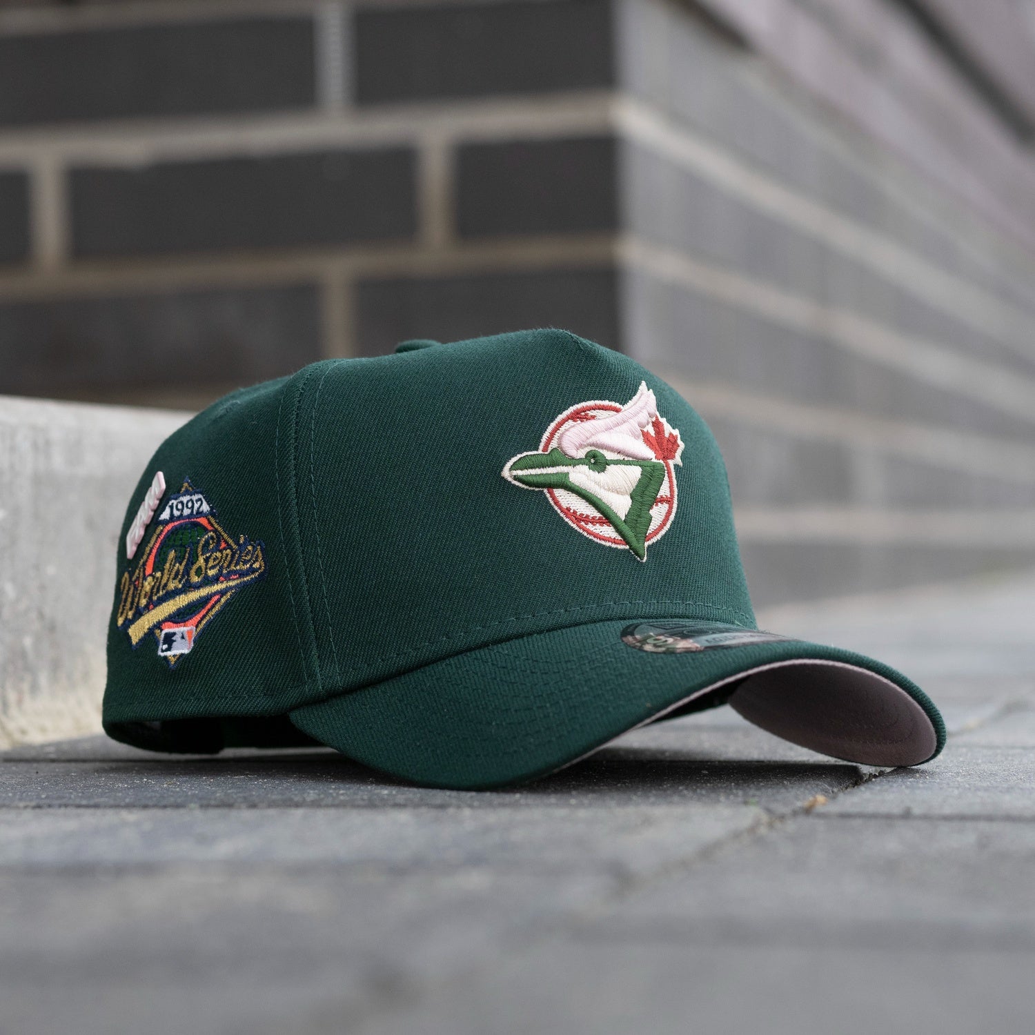 NEW ERA 9FORTY A-FRAME MLB TORONTO BLUE JAYS WORLD SERIES 1992 DARK GREEN / PINK UV SNAPBACK CAP