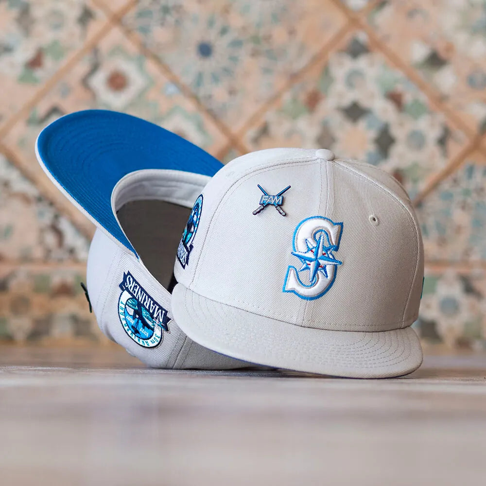 NEW ERA 59FIFTY MLB SEATTLE MARINERS 30TH ANNIVERSARY STONE / UNIVERSITY BLUE UV FITTED CAP